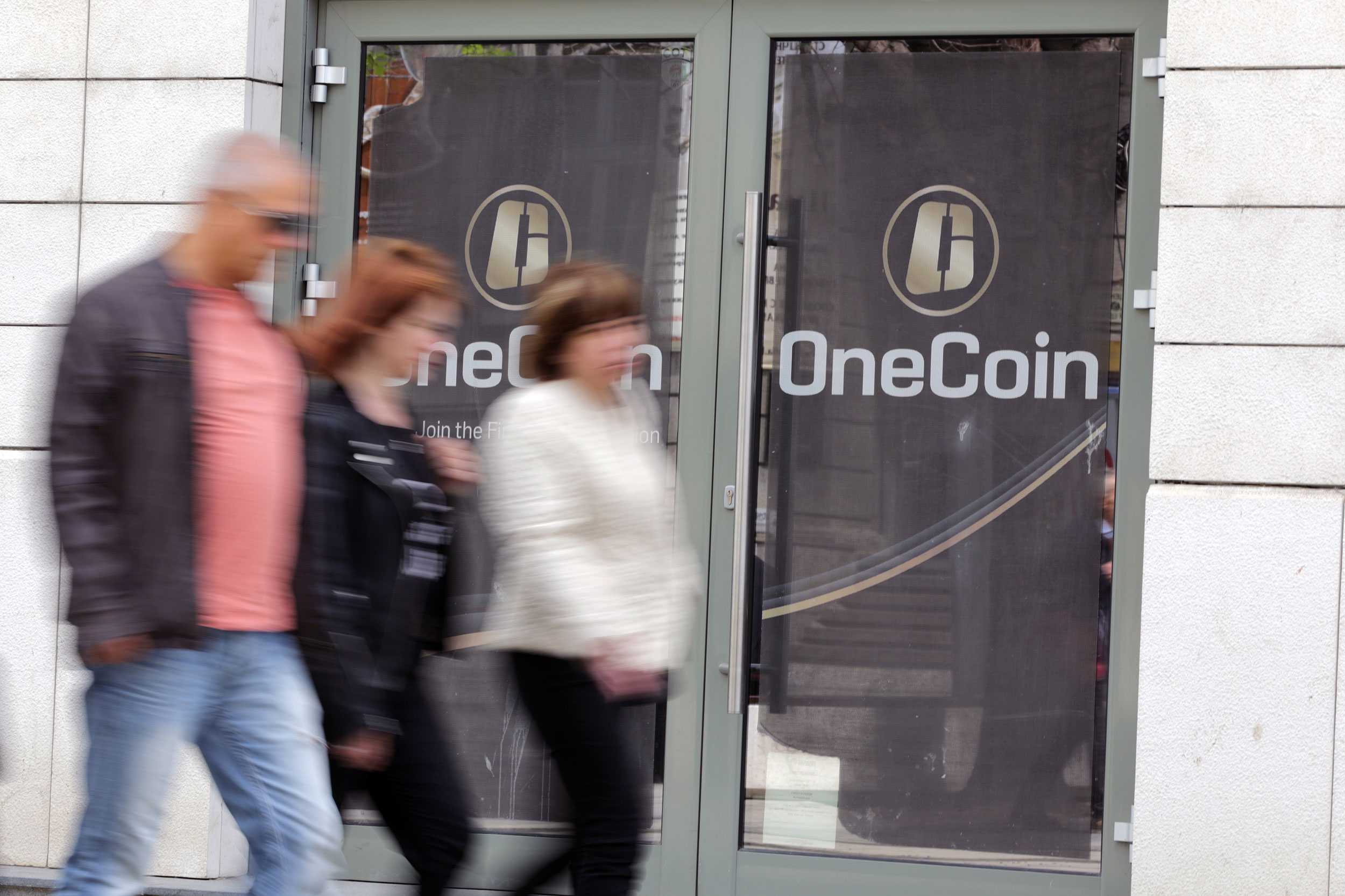 OneCoin logo on the office doors of the company